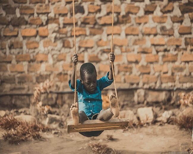 African Boy Swinging Painting By Numberss.png