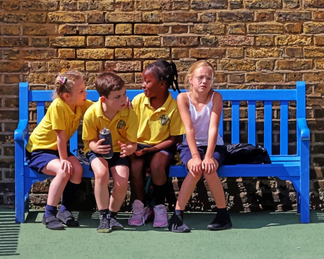 Children Sitting On A Blue Chair Painting By Numberss.png